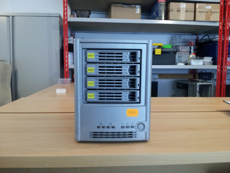 The image shows the Intel SS4000 (Lacie Branded Ethernet Disk) awaiting data recovery in our lab. The drive was reporting Smart error on one HDD. The 4 250GB hard drives are shown inserted in the front of the NAS.