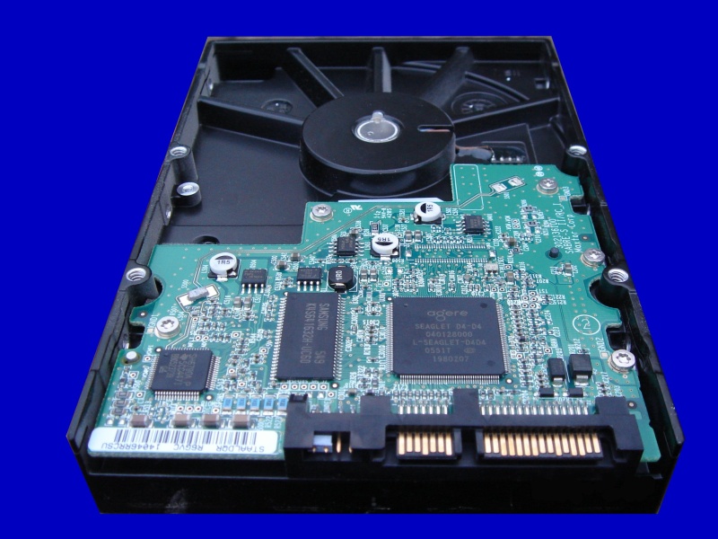 One of 2 200gb Maxtor hard drives. The image shows the circuit board side of the disk. They were configured for Raid 0 striped array on an Asus P4C800-E computer, but one of the disks was not recognised.