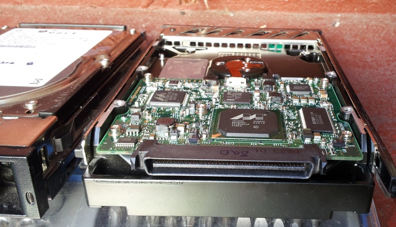 2 SCSI drives with SCA-80 connectors that were used in a Redhat linux 9 raid 1. The Raid failed after a power cut with ASYN start unit request failed error message before they were sent to us for data recovery. 