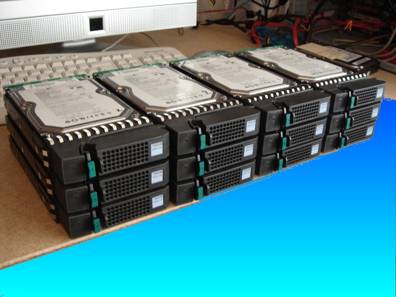 A set of 12 SAS hard disk drives that were removed from a Fujitsu Fibrecat after the raid5 array failed. The raid had restarted but some drives in Left-over state. Someone had foolishly tried to use the Trust command to start the raid, but fortunately they stopped it and sent the disks to us for data recovery.