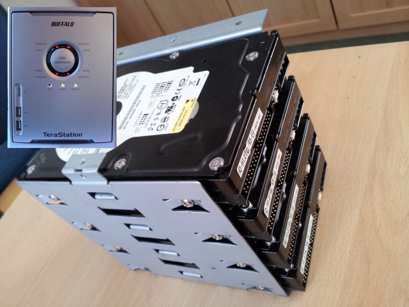 The photo shows the 4 ide hard drive by Western Digital taken from a terastation that had suffered an error in it's raid array. Also shown is the front view of a Buffalo Terastation model HD-H1.0TGL/R5 with its 4 red leds.