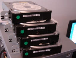The image shows the 4 hard disk drives taken out of a DriveStation Quattro for data recovery after one disk went faulty and the raid array card configuration was lost.