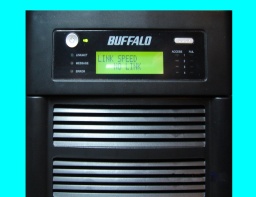 A Bufflo Terastation is shown with it's green led screen display. It shows E21 chip failure so required data recovery of the files. 