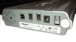 A Maxtor HD 160GB shown with it's USB and Firewire connections facing the camera. It failed to power up when switched on so was sent in for repair and recovery of the files. 