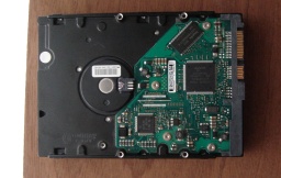 A Seagate hard drive showing it's circuit board. The pcb smelled of burning electronics and would not allow the computer to turn on - it immediately switched off when the disk was connected to the power supply cable, so was sent to us to retrieve the files.